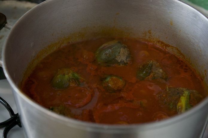 The artichokes are cooked gently in the tomato sauce