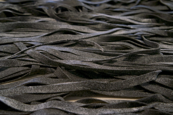 Lots and lots of ribbons of squid ink tagliatelle!
