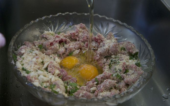 Adding some eggs and a splash of olive oil to the stuffing mixture