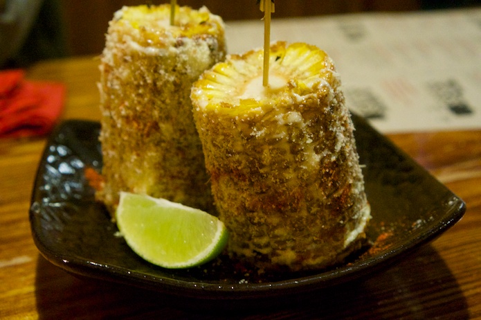 Elotes Callejeros - Mexican street corn dusted with a mix of spices